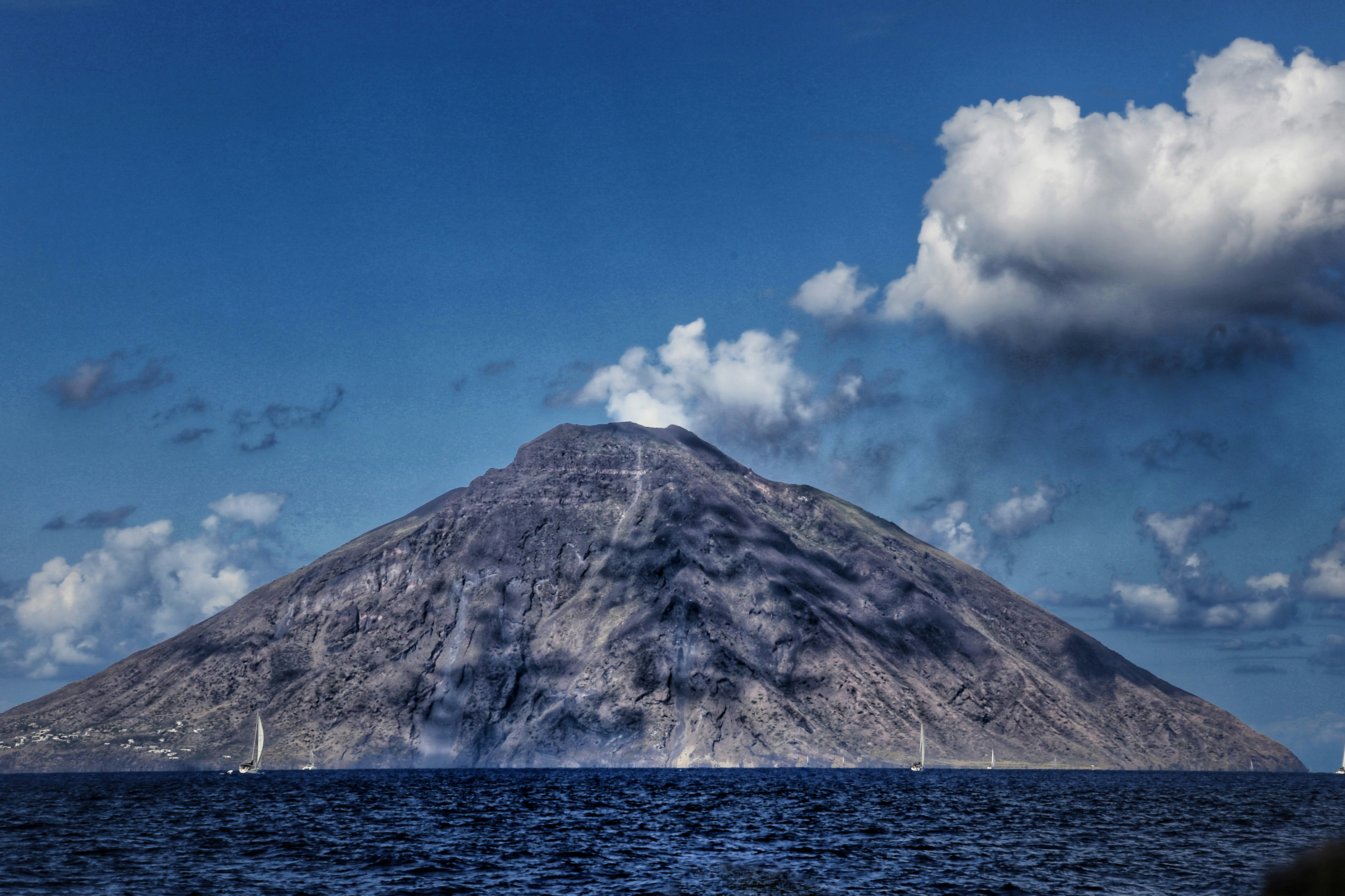 the volcanic stromboli island seen from the sea stromboli messina italien